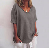 Relaxed fit blouse featuring a stylish V-neck design, perfect for casual outings and comfortable wear. 0