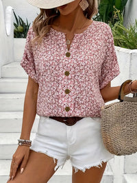 Short sleeve button top featuring a relaxed fit, ideal for casual wear and comfortable styling. 0