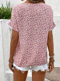 Short sleeve button top featuring a relaxed fit, ideal for casual wear and comfortable styling. 1