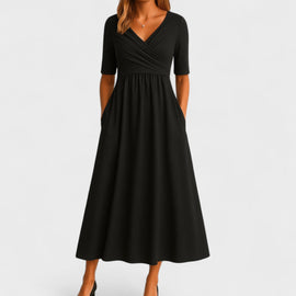 Elegant midi dress featuring a stylish V-neckline and a flattering silhouette, perfect for any occasion. 1