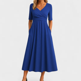 Elegant midi dress featuring a stylish V-neckline and a flattering silhouette, perfect for any occasion. 2